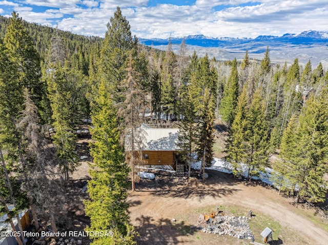 2 Porcupine Cir, Dubois, WY 82513 - aerial view of property and surrounding area with a mountainous background and a forest