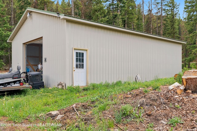 2 Porcupine Cir, Dubois, WY 82513 - view of home's exterior with a detached garage and an outdoor structure