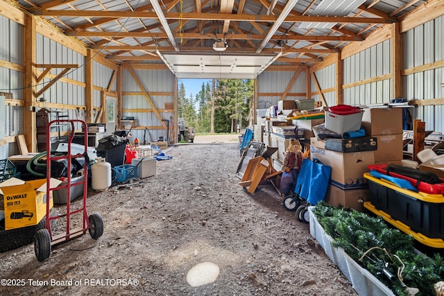 2 Porcupine Cir, Dubois, WY 82513 - garage featuring metal wall and a garage door opener