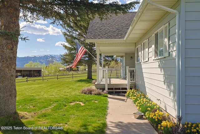 51 Buckaroo Cir, Etna, WY 83118 - view of yard with a deck with mountain view