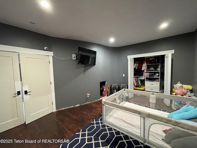 5860 Bitter Creek Rd, Afton, WY 83110 - bedroom with wood finished floors, recessed lighting, and a closet