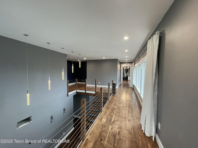 5860 Bitter Creek Rd, Afton, WY 83110 - hallway featuring wood finished floors, recessed lighting, and baseboards