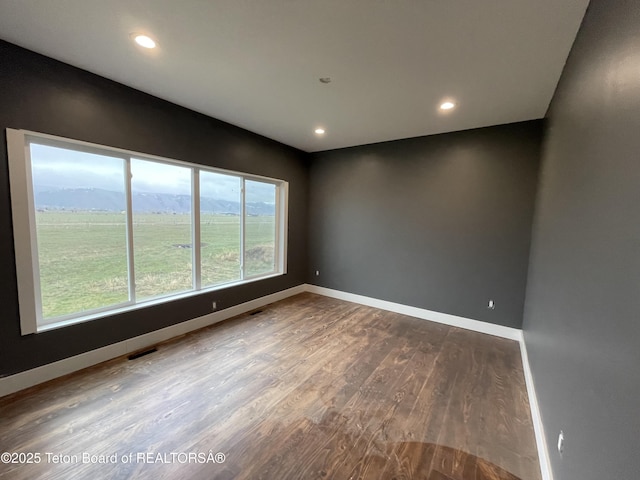 5860 Bitter Creek Rd, Afton, WY 83110 - spare room with wood finished floors, baseboards, and recessed lighting