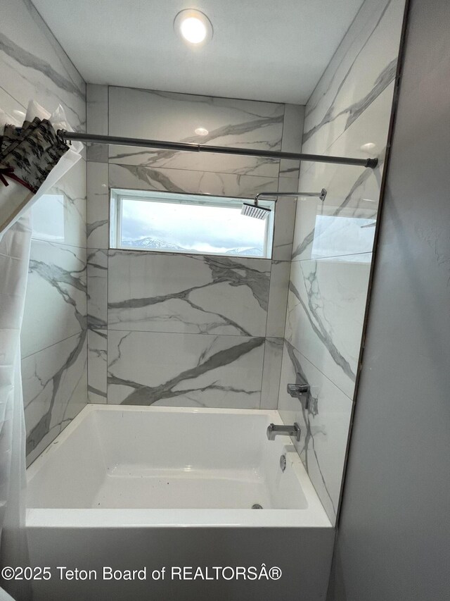 5860 Bitter Creek Rd, Afton, WY 83110 - full bathroom featuring shower / bathtub combination and plenty of natural light