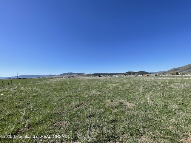 5860 Bitter Creek Rd, Afton, WY 83110 - view of mountain background with rural landscape