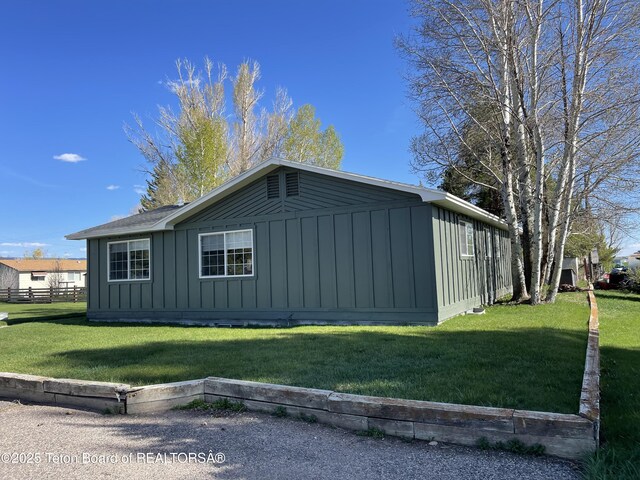 325 1st St N, Cokeville, WY 83114 - view of home's exterior with board and batten siding