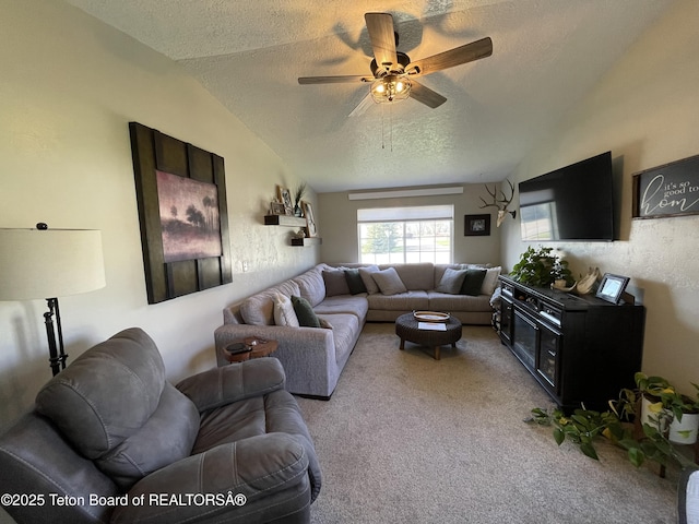 325 1st St N, Cokeville, WY 83114 - living room featuring a textured ceiling, light colored carpet, lofted ceiling, and a ceiling fan