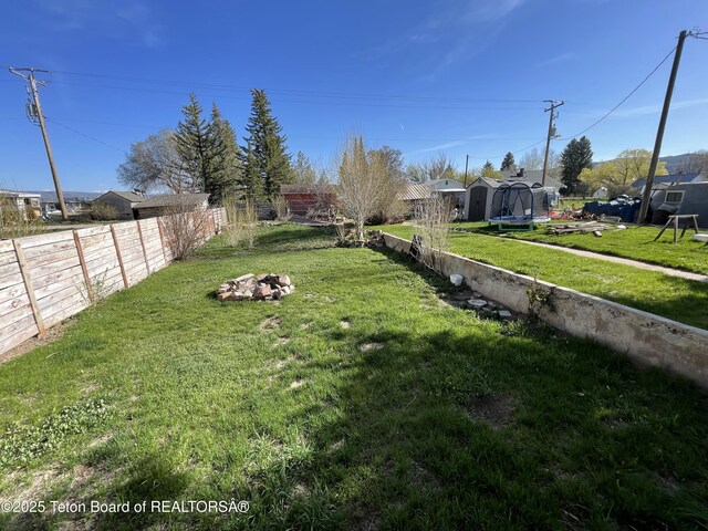 325 1st St N, Cokeville, WY 83114 - view of yard with a shed and an outbuilding