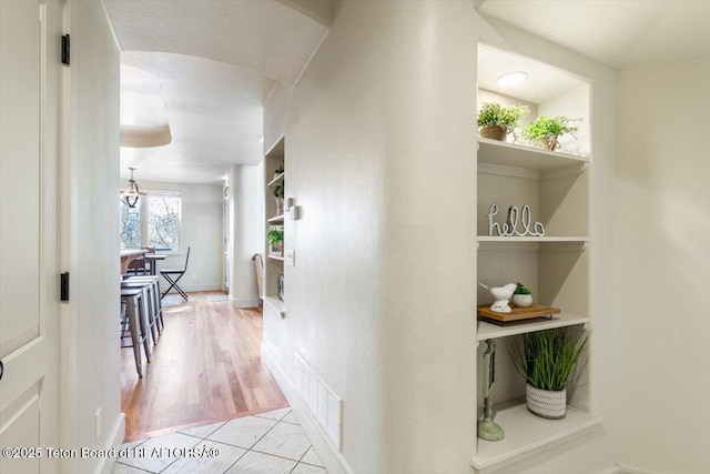 33 Willowbrook Dr, Driggs, ID 83422 - corridor featuring baseboards and light tile patterned floors