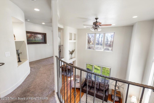 33 Willowbrook Dr, Driggs, ID 83422 - hall featuring an upstairs landing, plenty of natural light, carpet, recessed lighting, and baseboards