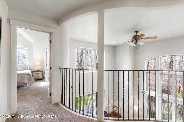 33 Willowbrook Dr, Driggs, ID 83422 - corridor with carpet floors, plenty of natural light, recessed lighting, and arched walkways