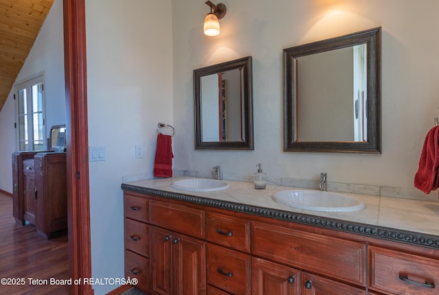 60 Flying Frog St, Dubois, WY 82513 - bathroom with double vanity and wood finished floors