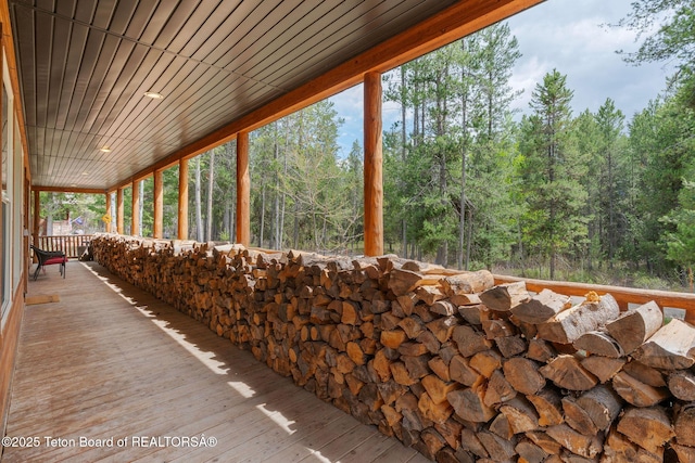view of patio with a forest view