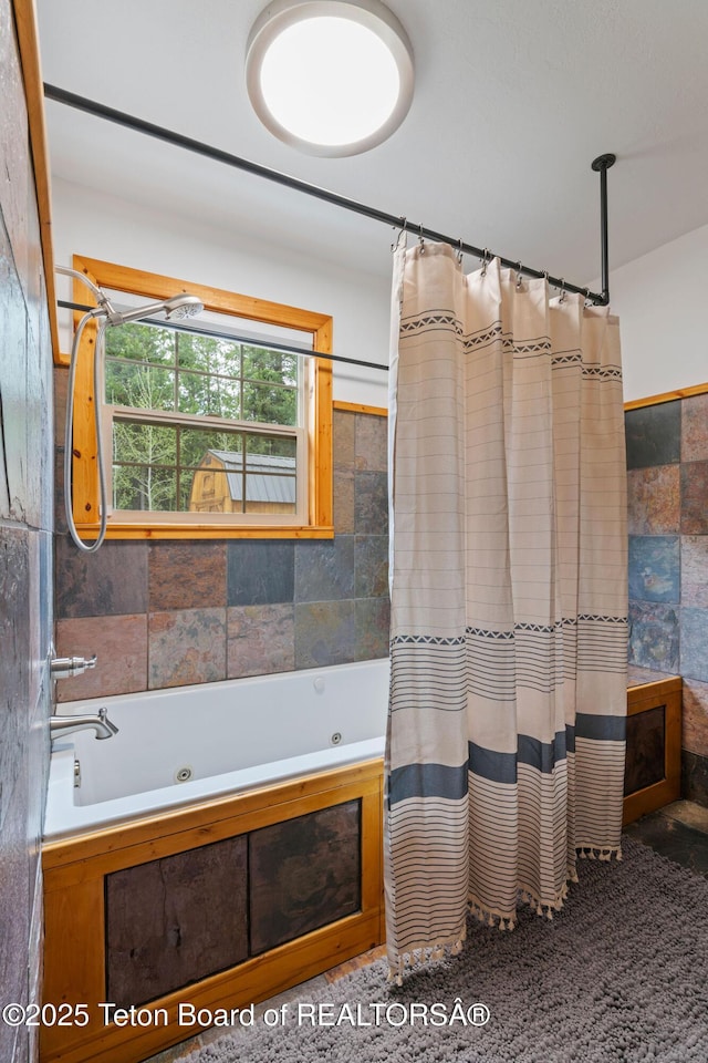 full bath featuring a tub with jets and a shower with shower curtain