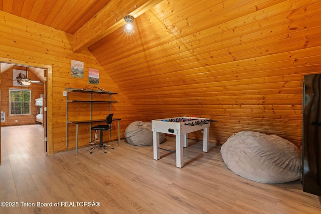 recreation room featuring wood ceiling, wood finished floors, wooden walls, and ceiling fan
