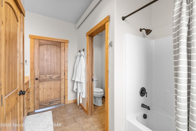 101 Alta Dr, Star Valley Ranch, WY 83127 - full bathroom featuring toilet, tile patterned floors, shower / bathtub combination with curtain, and baseboards