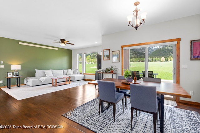 101 Alta Dr, Star Valley Ranch, WY 83127 - dining room with hardwood / wood-style floors, a chandelier, baseboards, and a ceiling fan