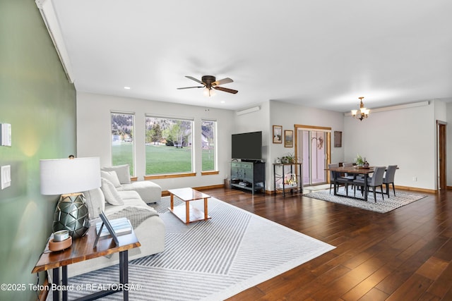 101 Alta Dr, Star Valley Ranch, WY 83127 - living area with a chandelier, wood-type flooring, a ceiling fan, baseboards, and recessed lighting