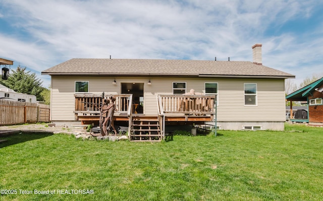 222 River Bench Rd, Alpine, WY 83128 - rear view of property featuring a deck, a chimney, and roof with shingles