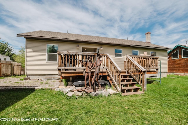 222 River Bench Rd, Alpine, WY 83128 - back of house featuring a wooden deck, a chimney, and stairs