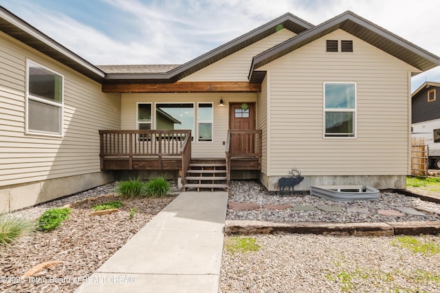 222 River Bench Rd, Alpine, WY 83128 - view of exterior entry with covered porch
