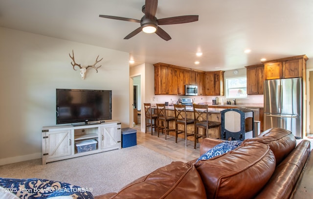 222 River Bench Rd, Alpine, WY 83128 - living area featuring ceiling fan, recessed lighting, and baseboards