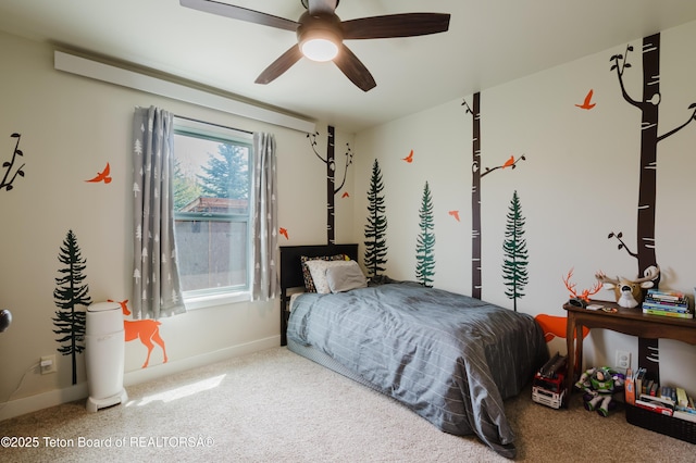 222 River Bench Rd, Alpine, WY 83128 - bedroom with carpet floors, baseboards, and a ceiling fan