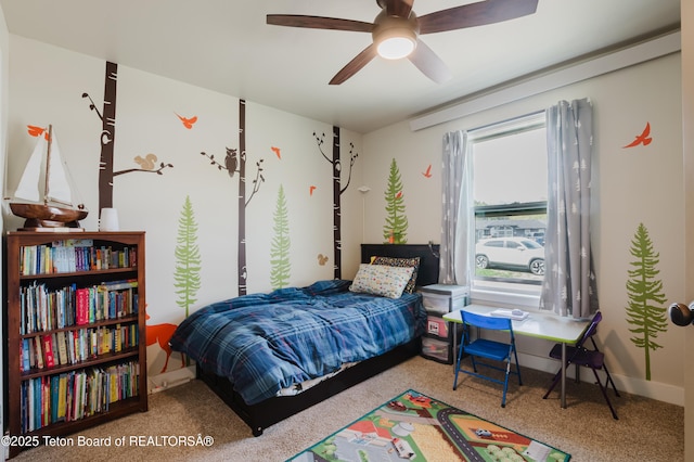 222 River Bench Rd, Alpine, WY 83128 - bedroom with carpet floors, ceiling fan, and baseboards
