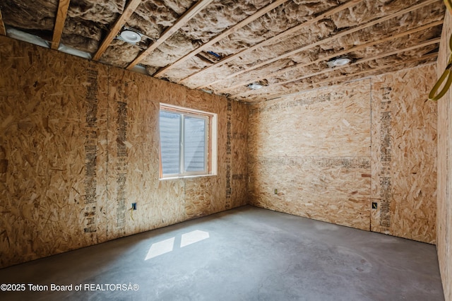 222 River Bench Rd, Alpine, WY 83128 - spare room with concrete floors