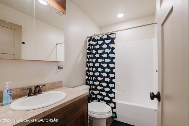 222 River Bench Rd, Alpine, WY 83128 - bathroom with toilet, vanity, and shower / bath combo