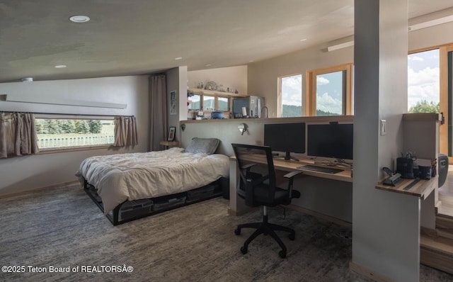 bedroom with an office area, recessed lighting, vaulted ceiling, and baseboards
