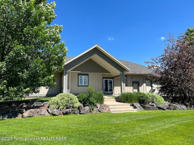96 Hardman Rd, Star Valley Ranch, WY 83127 - view of front of house with a front lawn