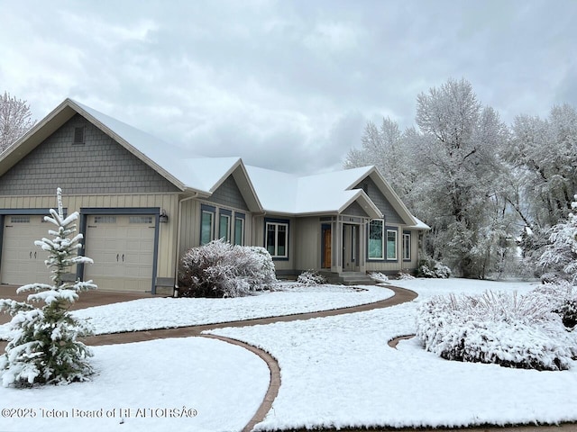 96 Hardman Rd, Star Valley Ranch, WY 83127 - single story home with an attached garage and board and batten siding