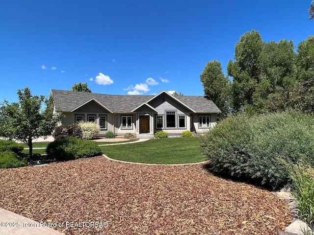 96 Hardman Rd, Star Valley Ranch, WY 83127 - ranch-style house featuring a front yard