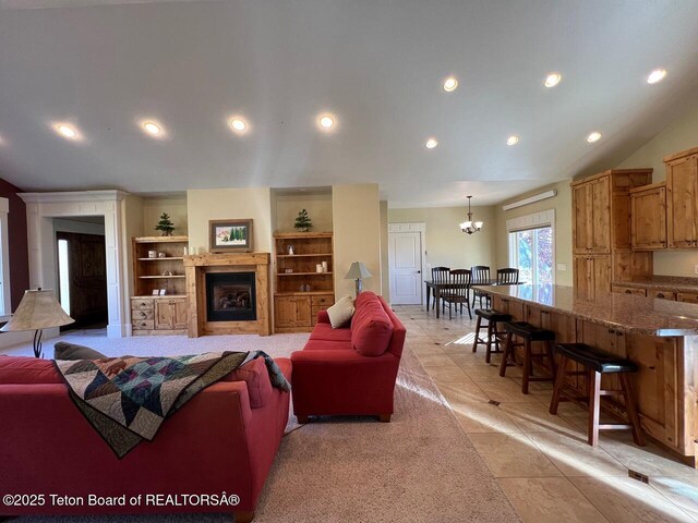 96 Hardman Rd, Star Valley Ranch, WY 83127 - living room with a chandelier, recessed lighting, a fireplace, and light tile patterned floors
