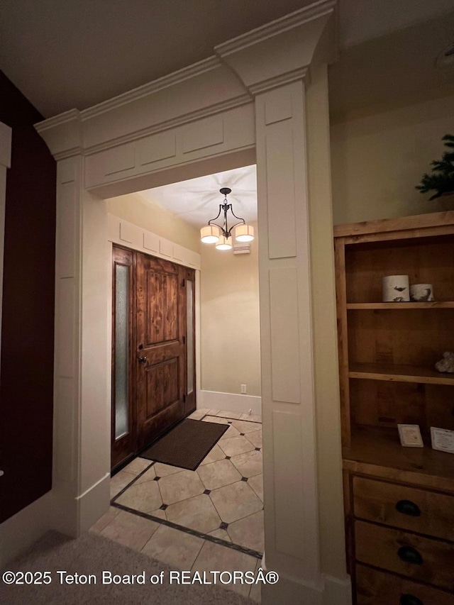 96 Hardman Rd, Star Valley Ranch, WY 83127 - entryway with a chandelier and light tile patterned floors