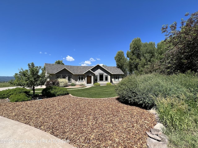 96 Hardman Rd, Star Valley Ranch, WY 83127 - single story home featuring a front lawn