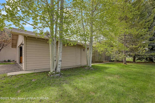 3455 S Tensleep Dr Unit 16, Jackson, WY 83001 - view of side of property with a yard