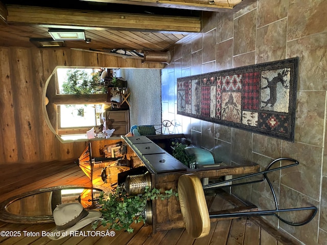 3 Forest Trl, Boulder, WY 82923 - living area with wood-type flooring, wood walls, and beam ceiling