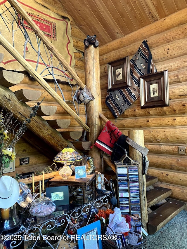 3 Forest Trl, Boulder, WY 82923 - misc room featuring log walls, wooden ceiling, stairway, and carpet floors