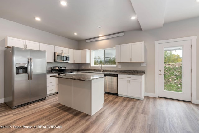 68 Alpine Trl Unit 38, Victor, ID 83455 - kitchen with appliances with stainless steel finishes, plenty of natural light, light wood-style flooring, and recessed lighting