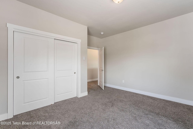 68 Alpine Trl Unit 38, Victor, ID 83455 - unfurnished bedroom with carpet flooring, baseboards, and a closet