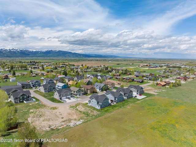 68 Alpine Trl Unit 38, Victor, ID 83455 - aerial perspective of suburban area featuring a mountain backdrop