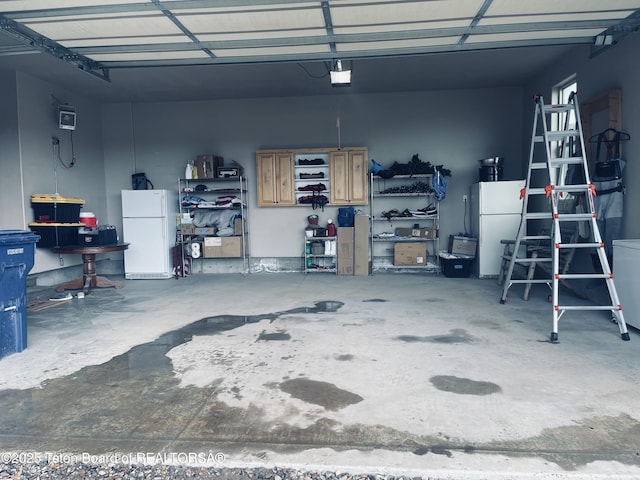 61 Astorian Ln, Smoot, WY 83126 - garage featuring freestanding refrigerator