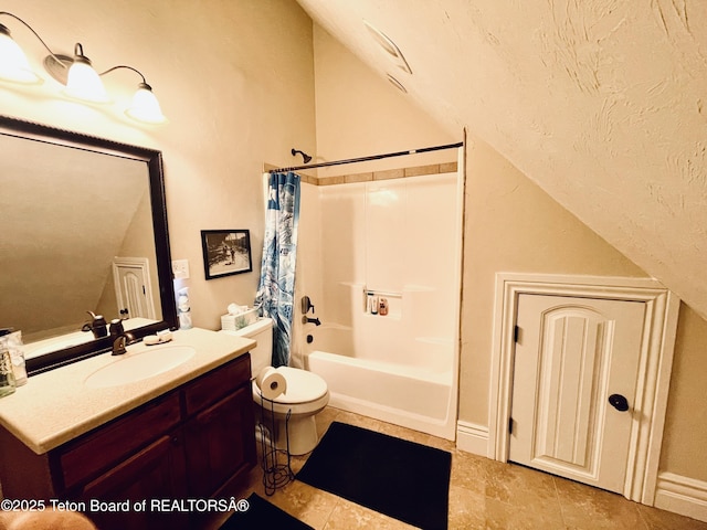 61 Astorian Ln, Smoot, WY 83126 - bathroom with lofted ceiling, shower / bath combo, vanity, toilet, and tile patterned flooring