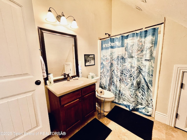 61 Astorian Ln, Smoot, WY 83126 - bathroom with vanity, toilet, and curtained shower