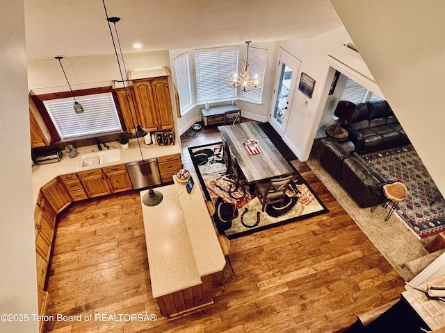 61 Astorian Ln, Smoot, WY 83126 - living area with light wood finished floors and a chandelier