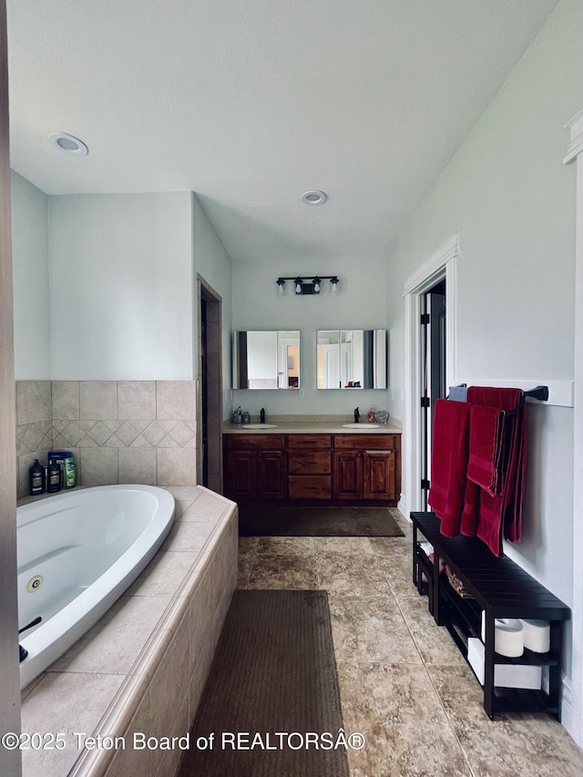 61 Astorian Ln, Smoot, WY 83126 - bathroom with a bath and double vanity