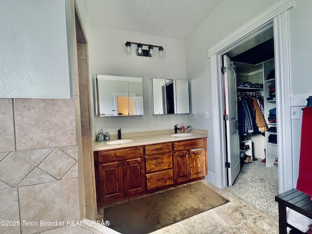 61 Astorian Ln, Smoot, WY 83126 - bathroom with double vanity and a walk in closet