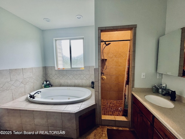 61 Astorian Ln, Smoot, WY 83126 - full bathroom featuring a shower stall, a whirlpool tub, and vanity